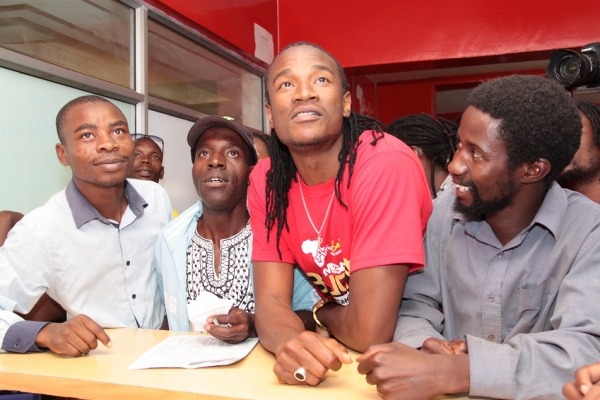 Africalotto brand ambasaddor Jah Prayzah visit the Africalotto Chinhoyi branch